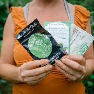 Woman holding seed packets