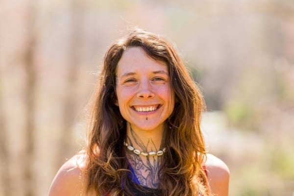 Nadi, an instructor for basic carpentry classes at Wild Abundance, smiling next to Natalie, the founder of Wild Abundance